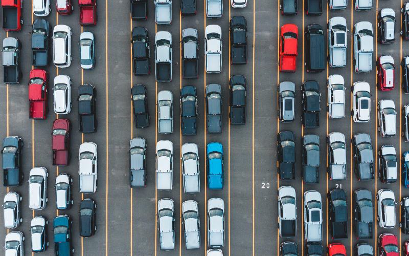 a parking lot with many cars