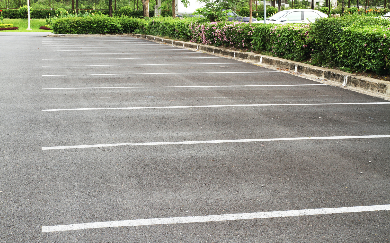 a parking lot with white lines